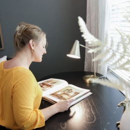 a woman reading a magazine